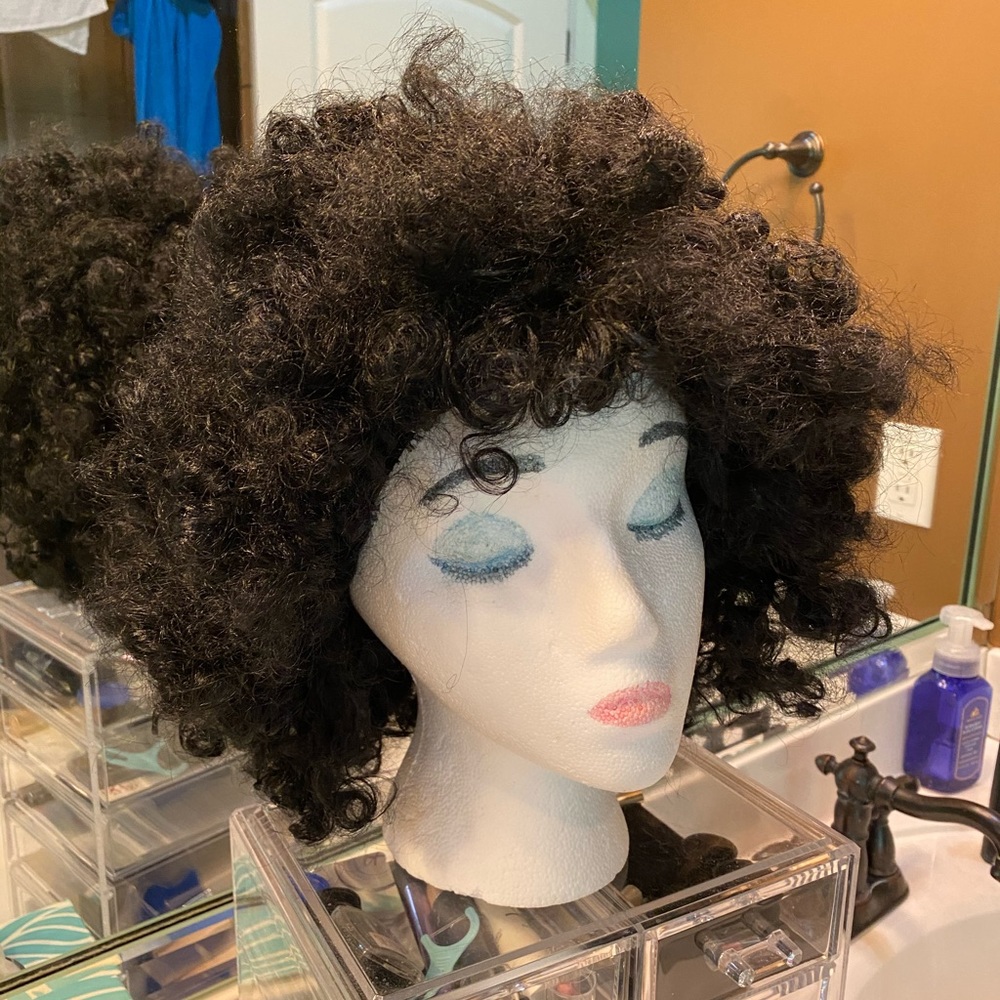 Black curly wig. Unisex.